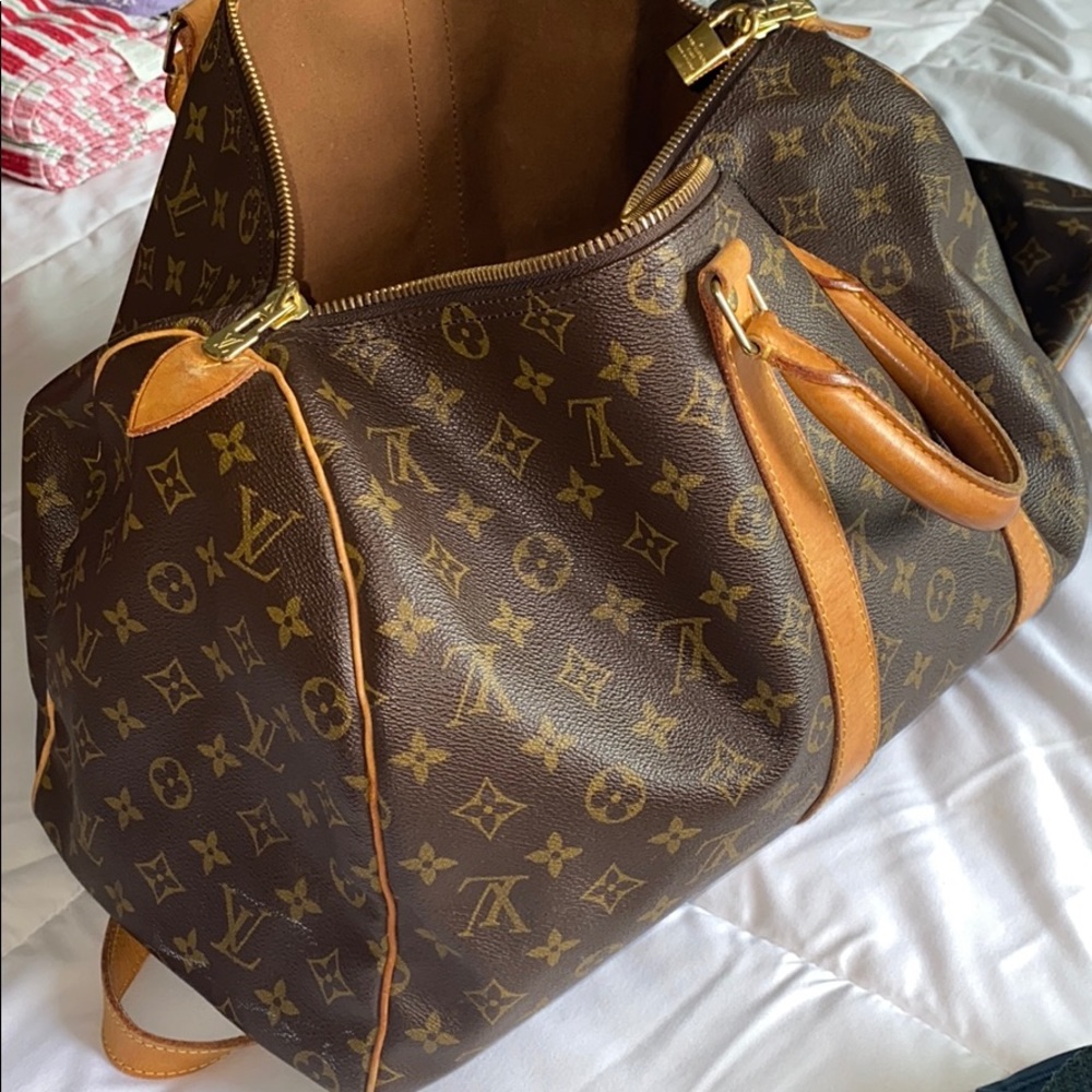 Louis Vuitton small luggage Normal wear.